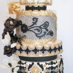 Gold and black wedding cake theme